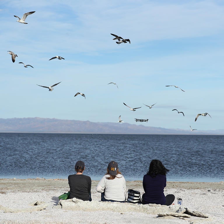 Women Sitting at Salton Sea